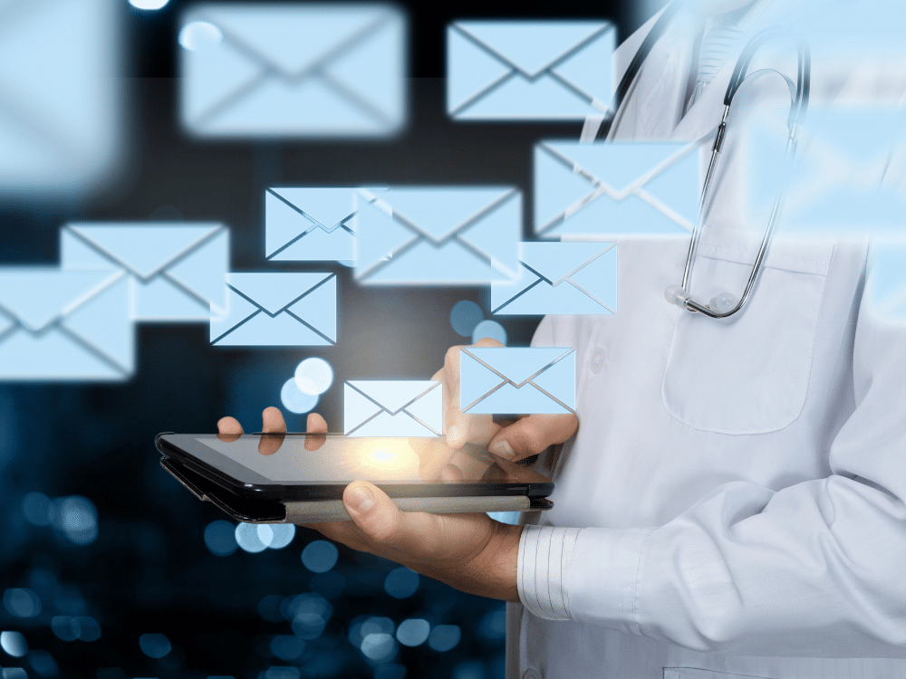 Plastic surgeon reviewing email marketing campaign performance — Discover how Salterra helps re-engage past patients and convert them into loyal, repeat clients.